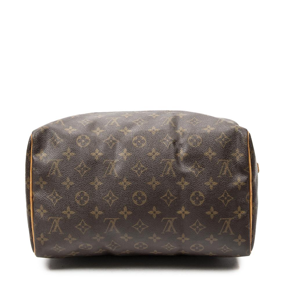 Sold at Auction: Louis Vuitton Coated Canvas Toiletry Pouch GM