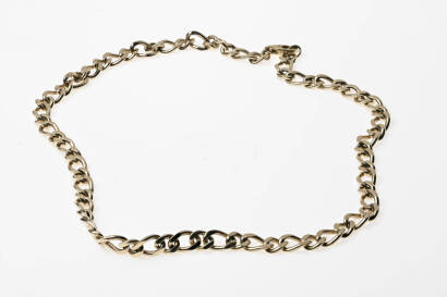 A gold necklace, of flattened curb link design. 14ct yellow gold. Weight 90 grams. Length 57cm. Width 9mm. 