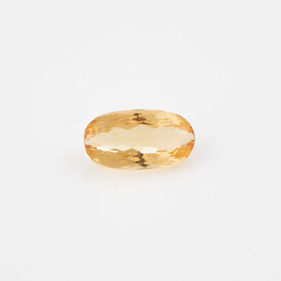 A Loose Oval Mixed cut, 5.73ct Yellow Topaz Gemstone