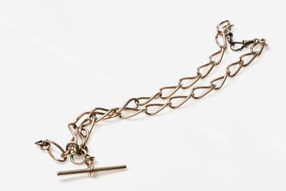 A Victorian gold albert chain. Stamped 15ct gold, the open curb link chain with T-bar and replacement clips. 15ct rose gold. Weight 45.8 grams. Length 44cm.