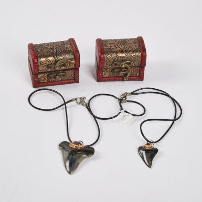 A Pair Of Small Decorative Chests And A Shark Tooth Necklace