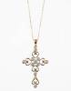 A gold and diamond cross, the filigree style cross set with ten modern round brilliant cut diamonds of known weight 0.56 carat. 9ct yellow gold. Weight 2.5 grams. Length 40mm. To be sold with a fine trace link chain. 18ct yellow gold. Weight 1.5 grams. Le