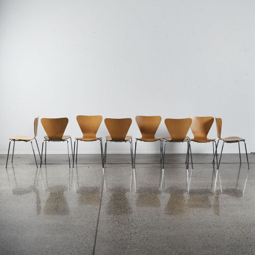 A Collection Of Eight Formed Ply Stacker Chairs