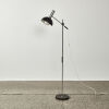 A Modernist Chrome And Black Floor Lamp