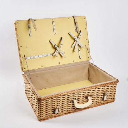 A Cane Picnic Basket With Leather Straps