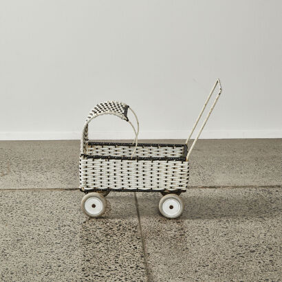 A Vintage Plastic-Coated Cane Dolls Pushchair