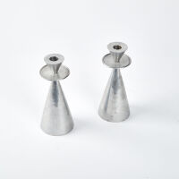 A Pair Of Modernist Aluminium Candlesticks