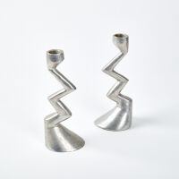 A Pair Of Design Store Zig Zag Candle Sticks