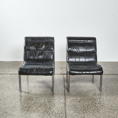 A Pair Of Vintage Sixties Chrome And Black Leather Chairs