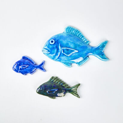 A Set Of Three Ceramic Fish By DC Ceramics