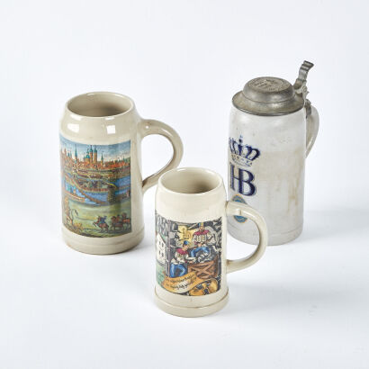 A Set Of Three Large Vintage German Beer Steins