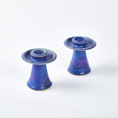 A Pair Of Graeme Storm Indigo Barium Glazed Candle Holders