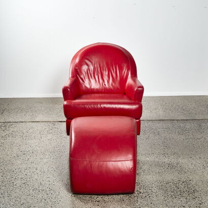 A Contemporary Red Leather Lounge Chair & Footstool