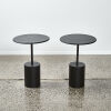 A Pair Of Black Cylindrical Side Tables