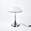 A Modernist Table Lamp With A Chrome Base And Frosted Glass Top
