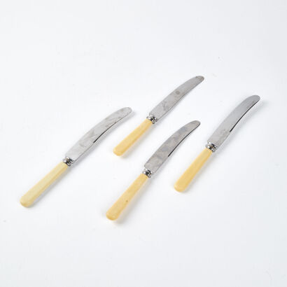 A Collection Of Four Vintage Butter Knives