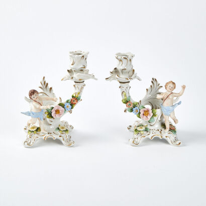 A Pair Of Sitzendorf Putti Thuringia Porcelain Candle Holders