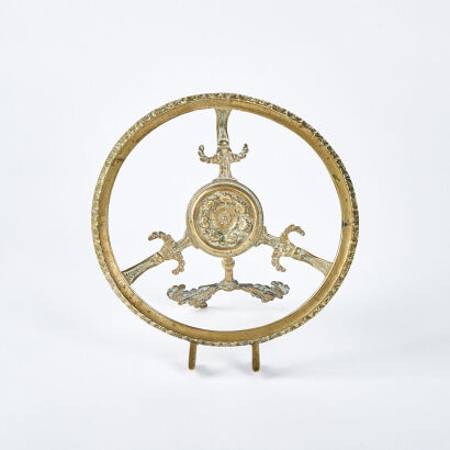 A Brass Firerange Trivet