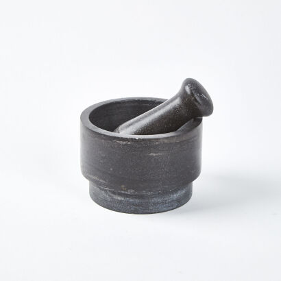 A Marble Mortar And Pestle