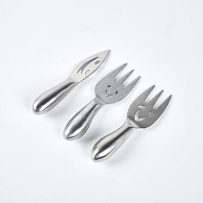 A Collection Of Three Happy Face Cheese Forks