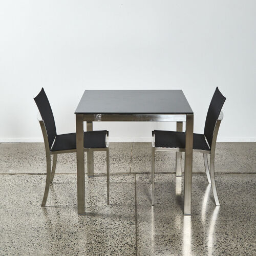 A Taboela Outdoor Table By Royal Botania With Two Chairs