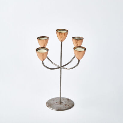 A Polish Copper And Steel Candelabra