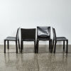 A Set Of Four Mario Bellini Cab 412 Dining Chairs By Cassina