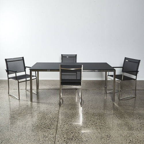 A Taboela Outdoor Table By Royal Botania With Four Chairs