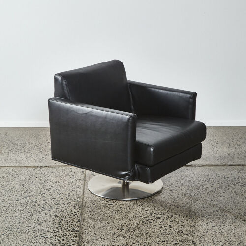 An Italian Divani Leather Swivel Chair