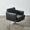 An Italian Divani Leather Swivel Chair