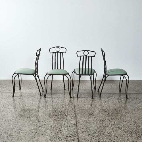 A Set Of Four Mid Century Wrought Iron Chairs
