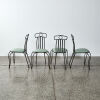 A Set Of Four Mid Century Wrought Iron Chairs