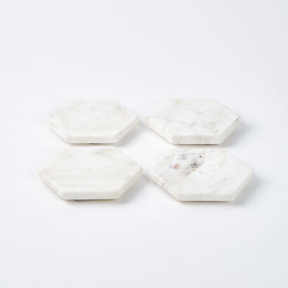 A Set Of Four Marble Coasters