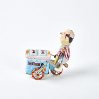 A Vintage Tin Ice Cream Vendor Toy