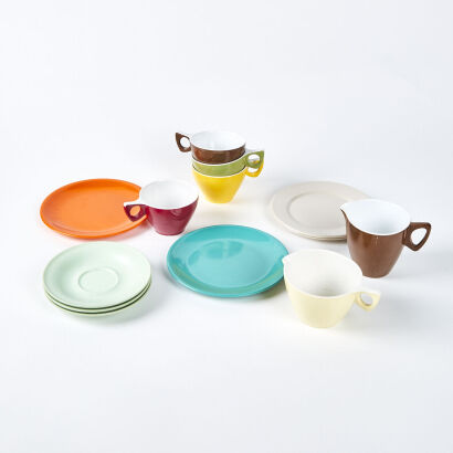 A 1960s Duraware Falcon Picnic Ware Including 4 Cups, Saucers, Plates, And Two Jugs