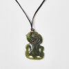 A Pounamu Hei Tiki with Red Wax Eyes, Aotearoa