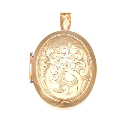 A large gold plated locket, decorative engraving on front. .Weight 21.8 grams. Length 6.1cm. Width 4.0cm