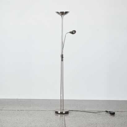 A Modern Chrome Floor Lamp With Upright & Adjustable Light