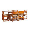 A Danish Teak Dining Table and Six Chairs