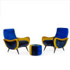 A Pair of Henriette Lounge Chairs and Ottoman