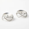 A Pair Of Georg Jensen Glow Candle Holders