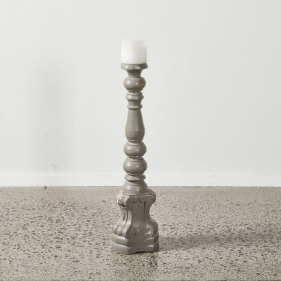 A Tall Ornate Candle Holder