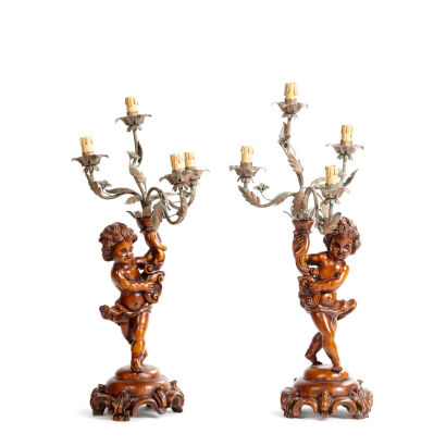 A Pair of Spanish Wooden Cherub Candelabras