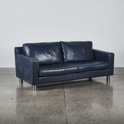 A Contemporary Navy Leather Three Seater Sofa
