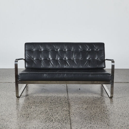An Italian Black Leather and Chrome Lowline Sofa