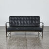 An Italian Black Leather and Chrome Lowline Sofa