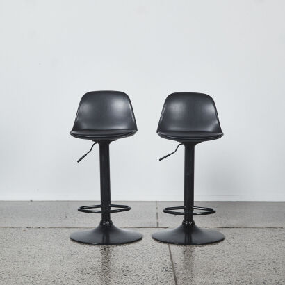 A Pair Of Modern Barstools In Black