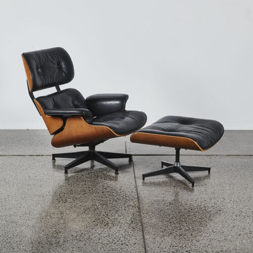 An Eames Style Lounge Chair With Footstool