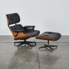 An Eames Style Lounge Chair With Footstool