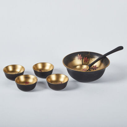 A Small Lacquer Bowl With A Spoon And Four Small Dishes